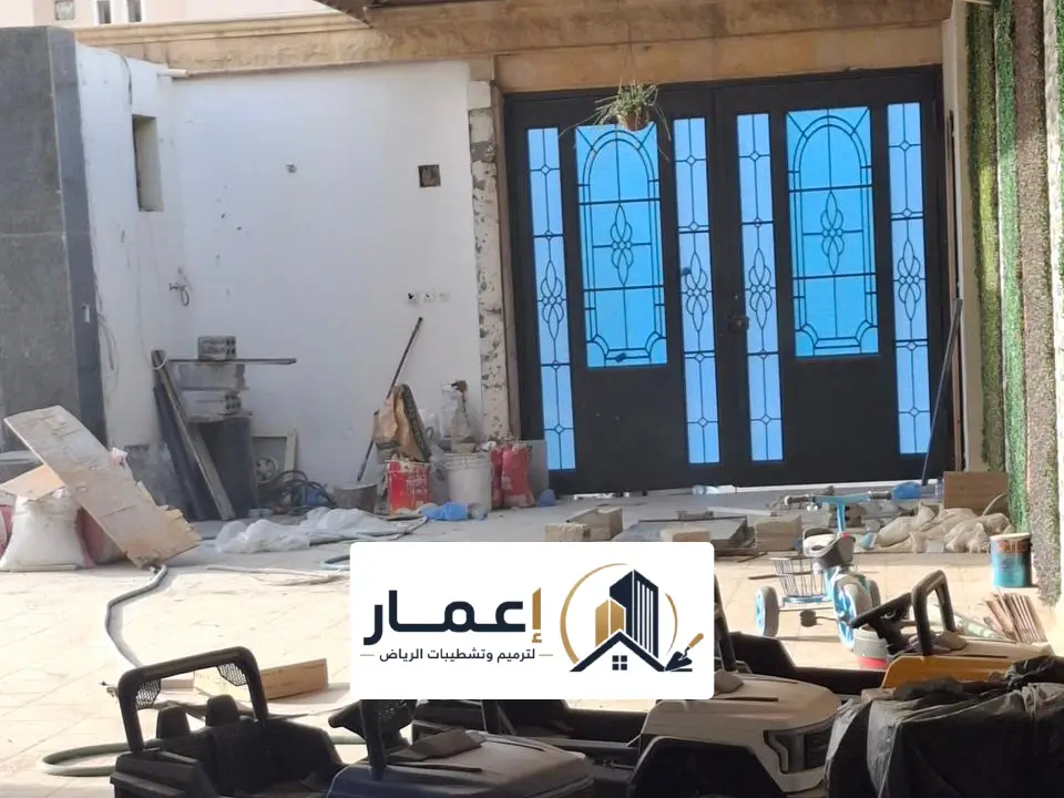 دهان ابواب حديد اسود وذهبي الرياض